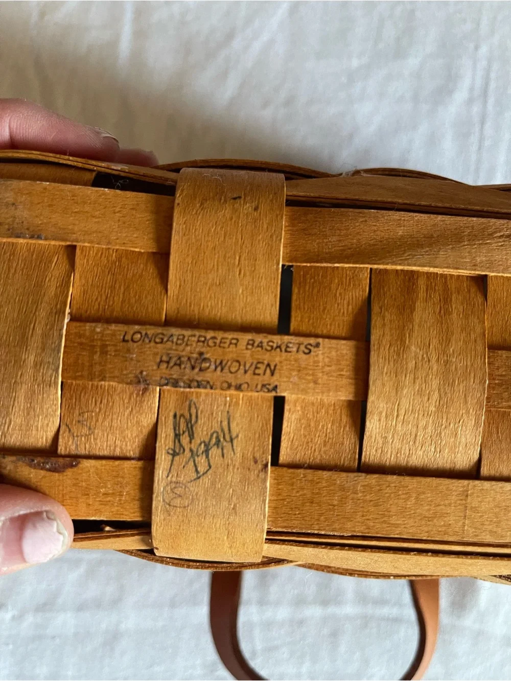 Longaberger woven basket in warm tan